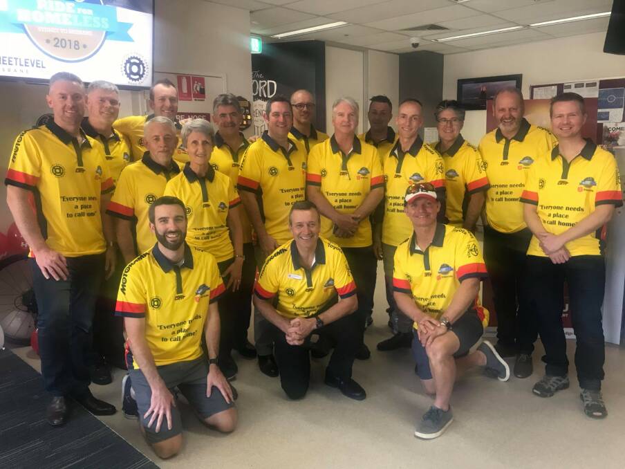 Mr Harrison (sixth from right) joined the Streetlevel Mission's Ride For Homeless fund-raiser as the official mechanic. Photo: Supplied