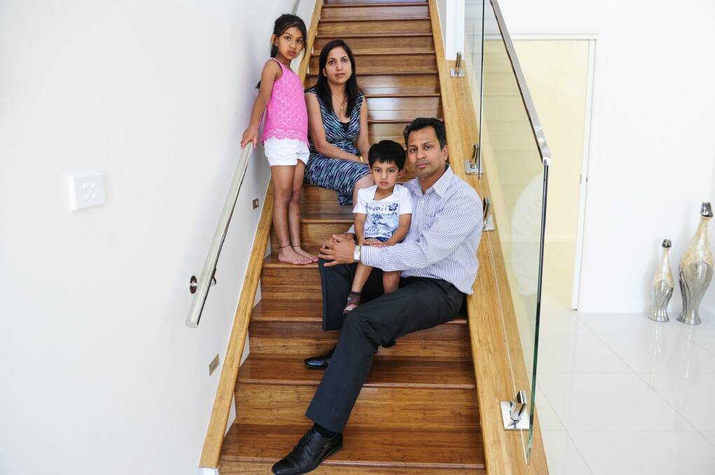 The Singhal family: Ajay and his wife Shweta and their children Aanya,7 and Aditya,4.  Photo: Melissa Adams