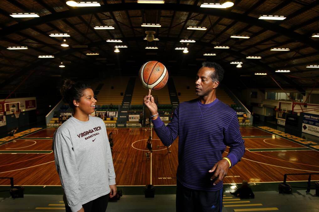 Hannah Young with her father Lewis Young, a former professional basketball player and Harlem Globetrotter, in 2012. Photo: Jonathan Carroll