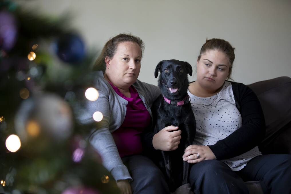 Amanda and Alice Hanks with their dog Ruby, which was shot last Monday. Photo: Sitthixay Ditthavong