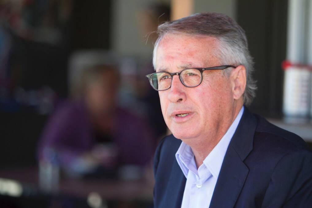 Joe Hockey says Wayne Swan, pictured, "was expecting $401.2 billion in receipts for this financial year (2014-15), this MYEFO shows we are expecting $379.5 billion in receipts for this financial year - a writedown of $21.7 billion". Photo: Glenn Hunt