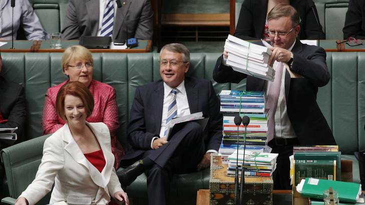 Prime Minister Julia Gillard faced down foes on both sides of the chamber after a broadside from Kevin Rudd fuelled Tony Abbott and Julie Bishop's question time fire. Photo: Alex Ellinghausen