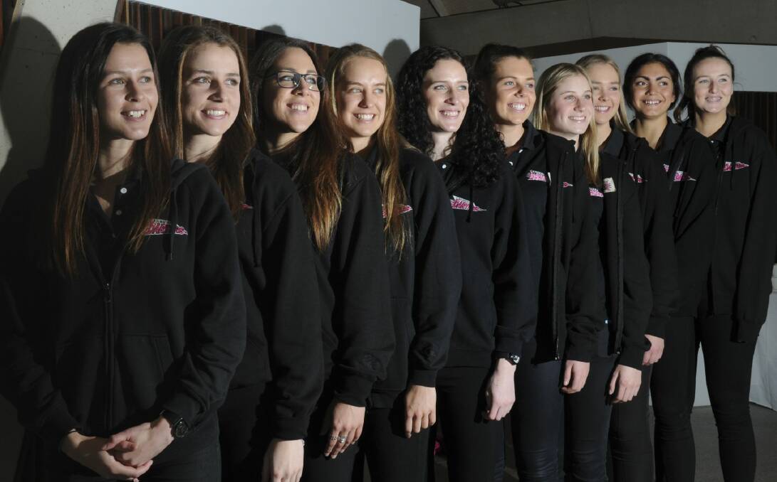 The Canberra Darters squad is ready for the start of the Australian Netball League season on Saturday. Photo: Graham Tidy