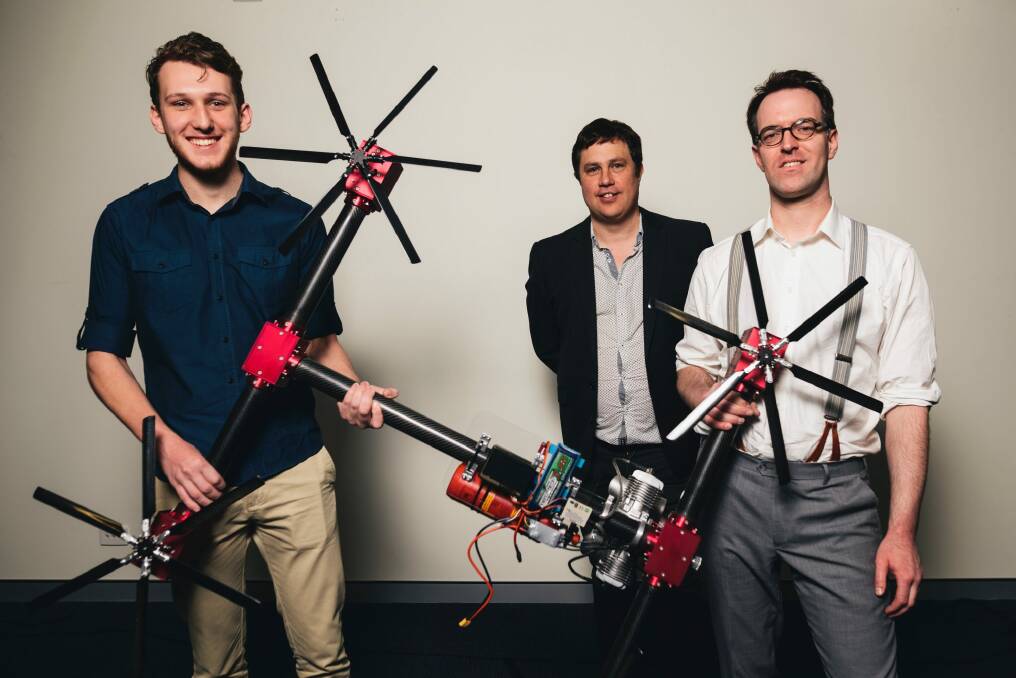 SOAPdrones technician Aidan Cavanagh (left), chief executive Matthew Altenburg and chief technical officer Paul Riess with the petrol-fueled drone the company is developing. Photo: Rohan Thomson