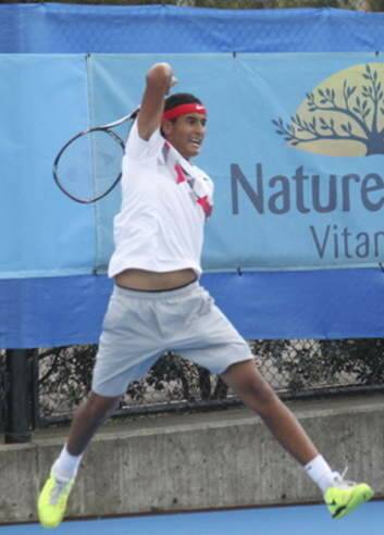Nick Kyrgios unleashes a forehand on Sunday. Photo: Briony Craber