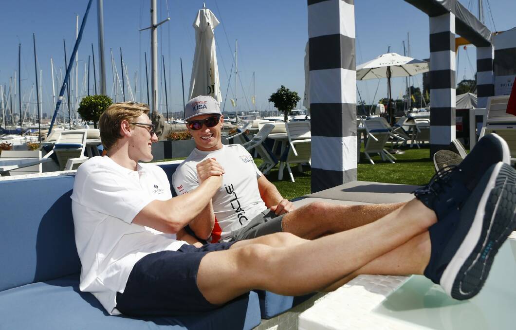 Kicking back: Olympic swimmer Mack Horton with James Spithill during promotions for the Sydney to Hobart. Photo: Daniel Munoz