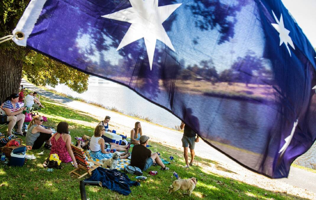 People relaxing around the banks of the Yarra River celebrating Australia Day in 2014 Photo: Luis Enrique Ascui