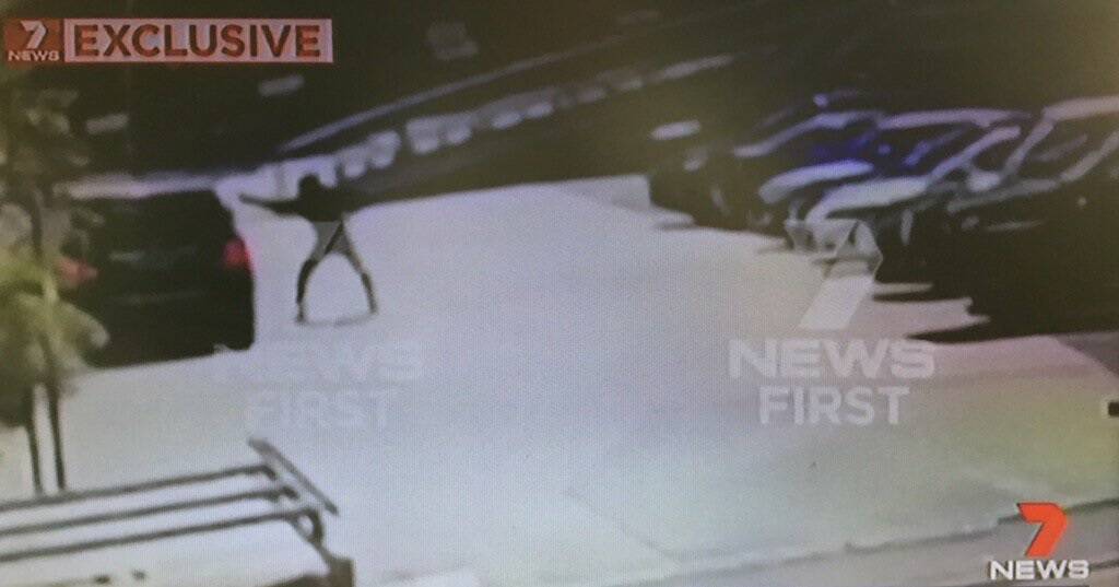Footage shows the balaclava-clad gunman firing a barrage of bullets into the driver's side window of Hawi's car. Photo: Seven News