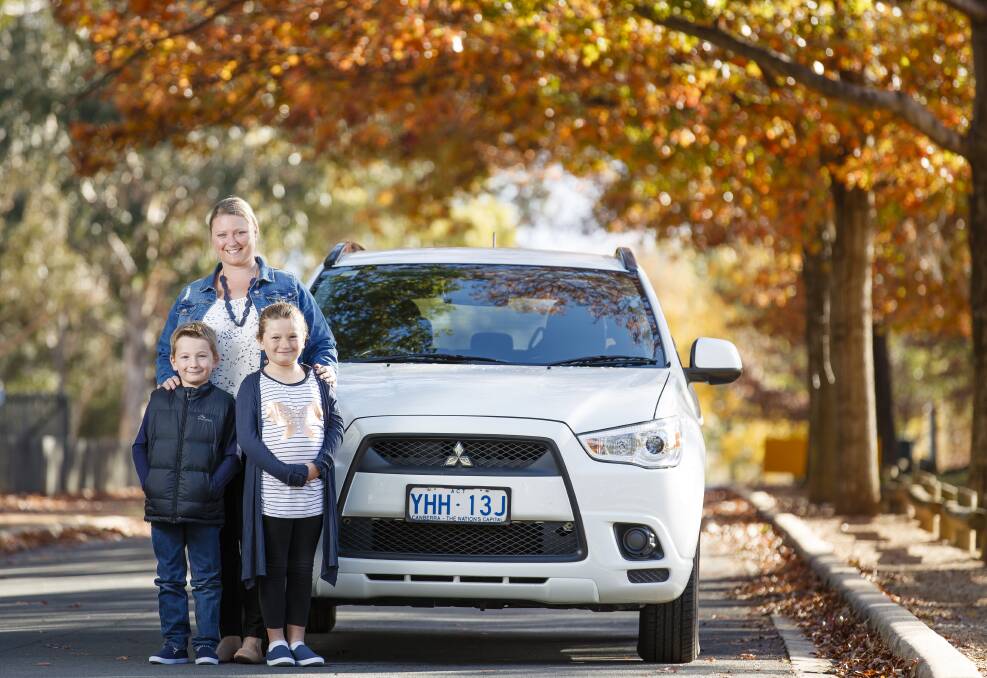 Emma Edmeades, one of the first Shebah drivers in Canberra, with her children Finnley, 7, and Chloe, 9.  Photo: Sitthixay Ditthavong