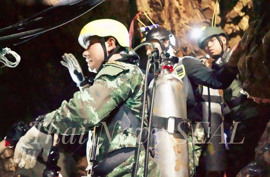Thai Navy SEALs work to drain water out of the cave as fast as possible. Photo: Thai SEAL/Facebook