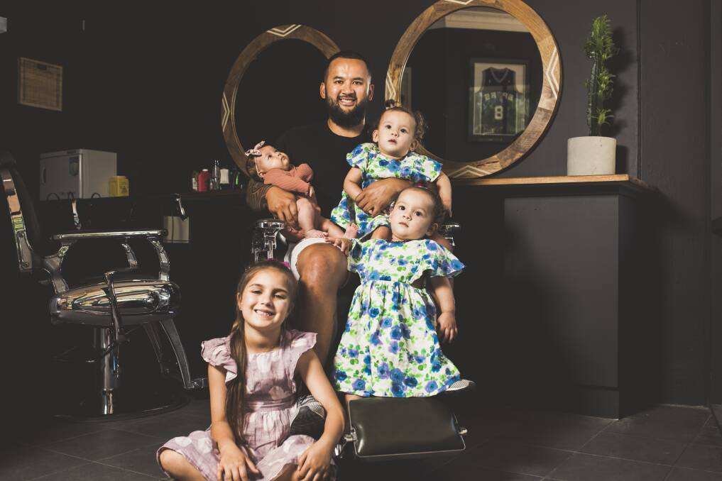 Casper Aniversario with his four daughters (from left) Eva, 6, Acacia, 2-months, and twins Gigi and Franki, 16-months. Photo: Jamila Toderas