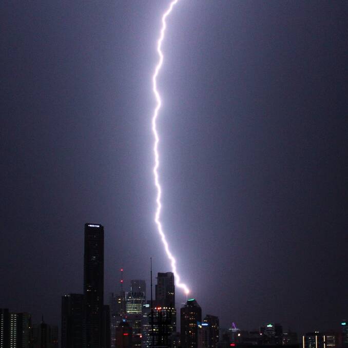 Another lightning bolt hits Brisbane on Monday night. Photo: Chris McKennariey - Facebook