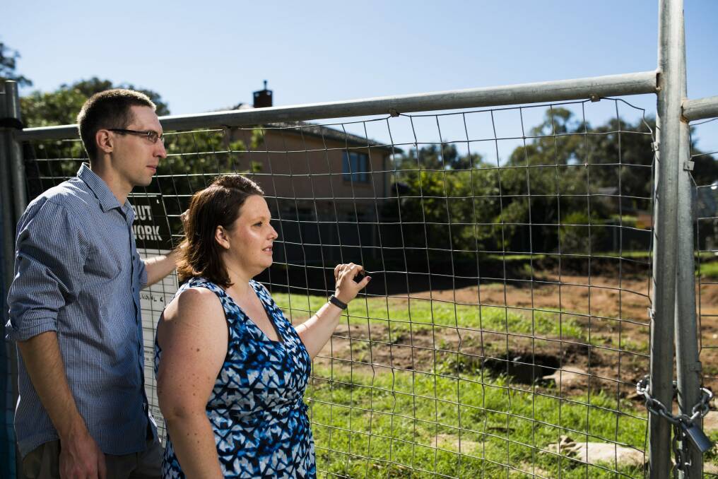 Chris and Christina Pilkington outside their cleared Ainslie Fluffy block, for which the government wants $725,000. Photo: Rohan Thomson