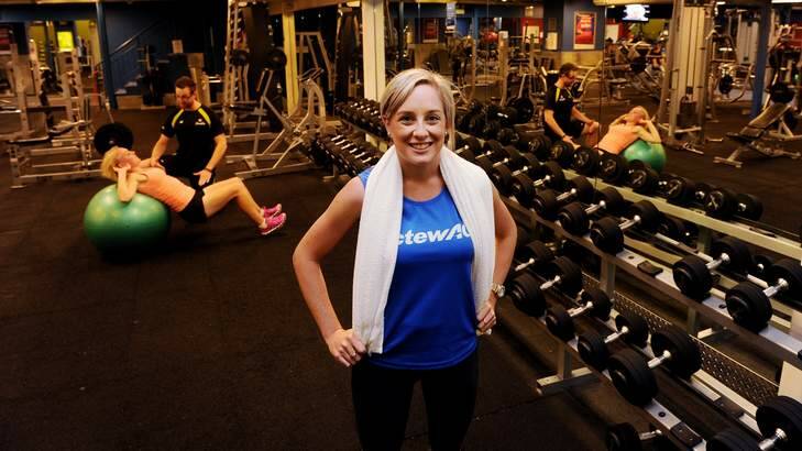 ActewAGL workers Jess Brown (right) Tracey McRoberts (background, on ball) have the use of the Fitness First gym in the Canberra Centre as an employment perk. Photo: Colleen Petch