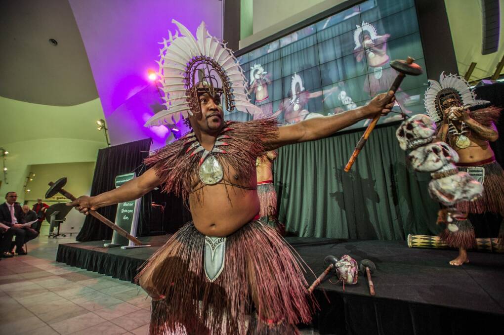 A Torres Strait dance group performed in full mask and tribal costumes to launch a new exhibition at the National Museum of Australia, Evolution: Torres Strait Masks. Photo: Karleen Minney