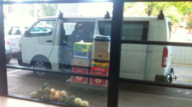 Bad example: A fruit and vegetable distributor leaves food on the ground while making deliveries.