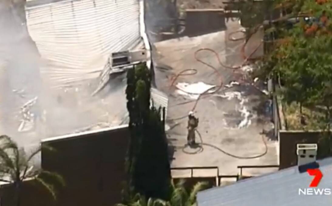 Firefighters are assessing the damage at the fire that broke out at Highgate Hill on Wednesday. Photo: 7 News