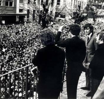 The Beatles wave to the crowd below from the balcony of the Southern Cross Hotel in Melbourne, during their Australia/NZ tour, June 1964.