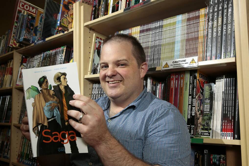 Impact Comics owner manager Mal Briggs saw a 10 per cent increase in sales last year. Photo: Jeffrey Chan