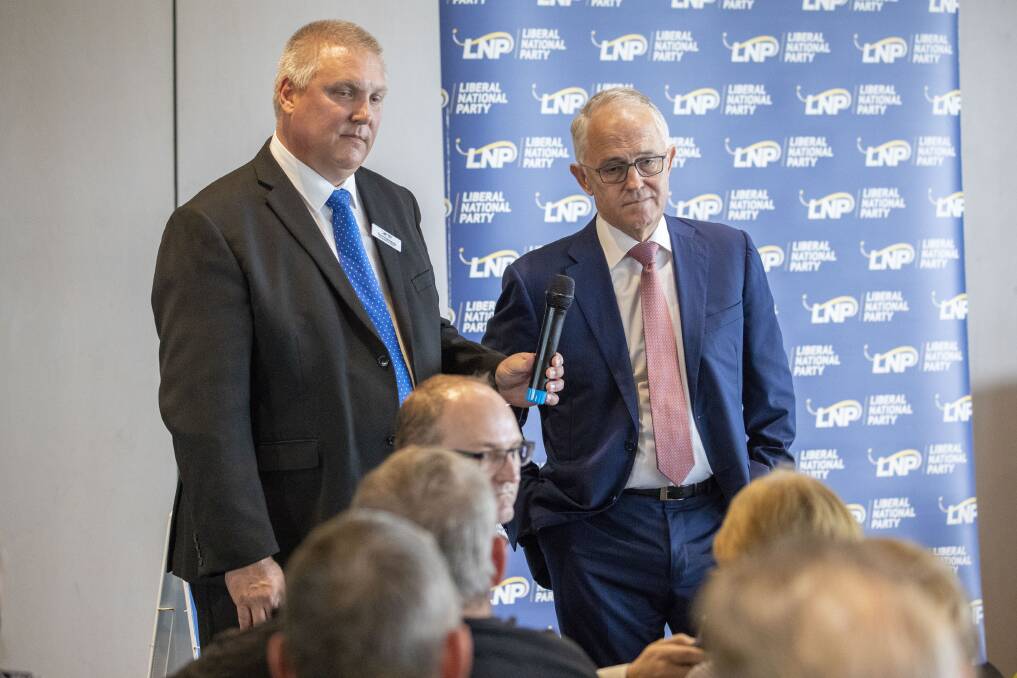 Prime Minister Malcolm Turnbull during an earlier appearance with the LNP's candidate for Longman, Trevor Ruthenberg.  Photo: AAP