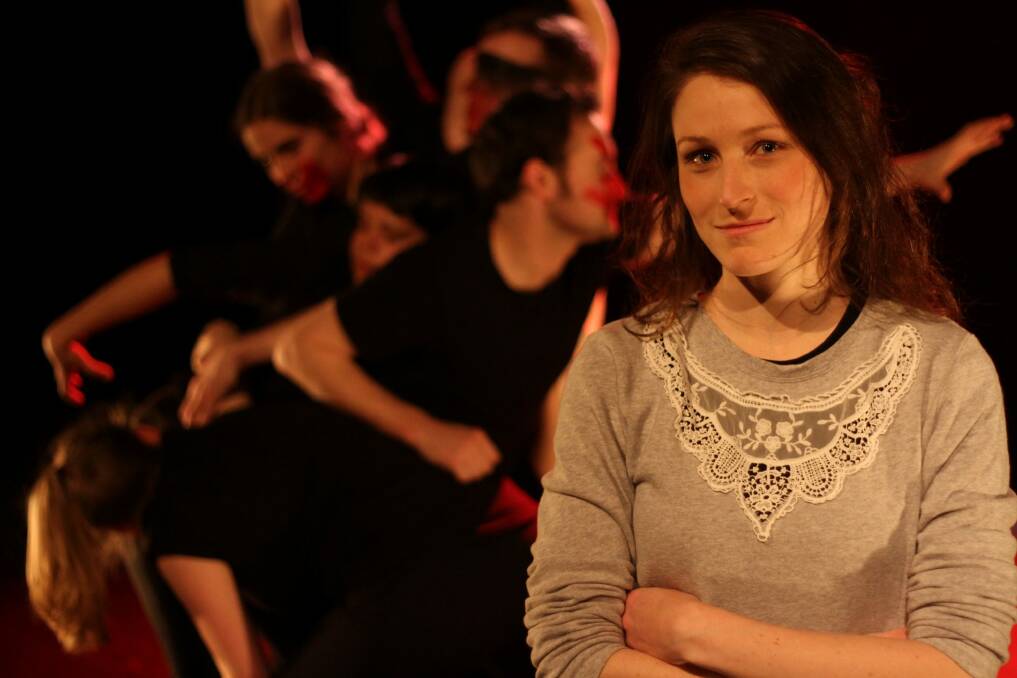 Alison Plevey, senior movement tutor at Canberra Youth Theatre, with senior ensemble members. Photo: Nick Stannard