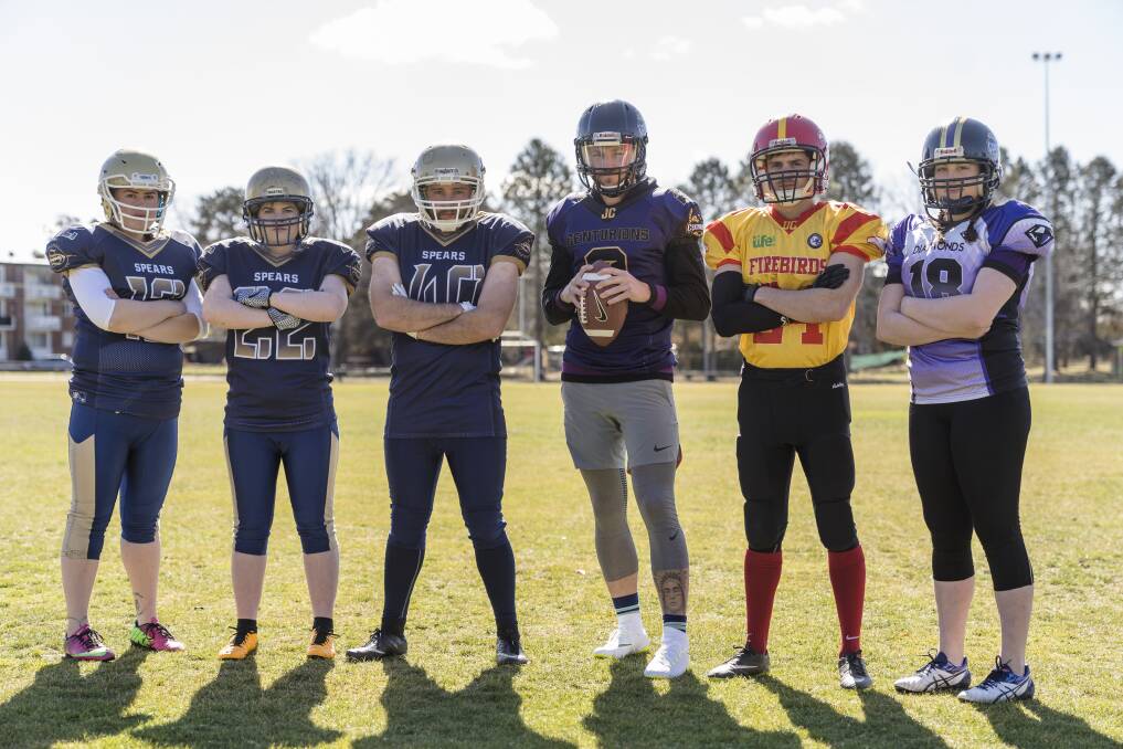 Spears players Kara Hammell, Jessica Conrick and Lachlan Bayliss are joined by Beau Kennett (Centurions) Laurence Marin (Firebirds) and Amy Van Lohuizen launch the 2018-19 ACT Gridiron season. Photo: Lawrence Atkin