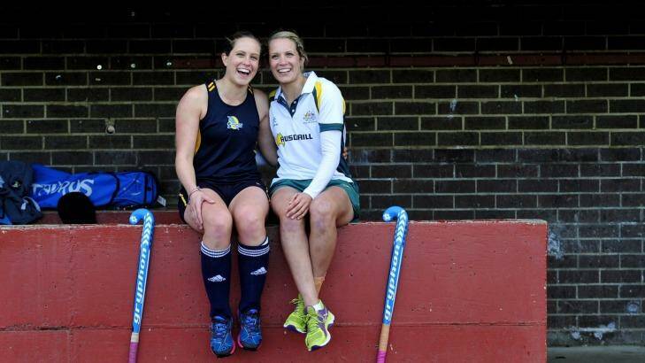 Meredith Bone (left) with her twin sister, Hockeyroos player Edwina Bone, at the National Hockey Centre. Photo: Melissa Adams