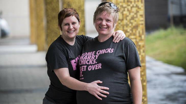 Claire Worrall and Kelly Butcher from Canberra plan to get married after the ACT passed a same-sex marriage bill on Tuesday. Photo: Rohan Thomson