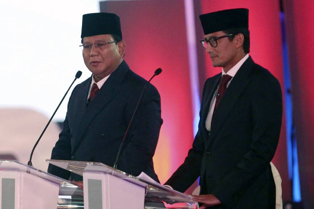 Indonesian presidential candidate Prabowo Subianto and his running mate Sandiaga Uno during the debate. Photo: AP