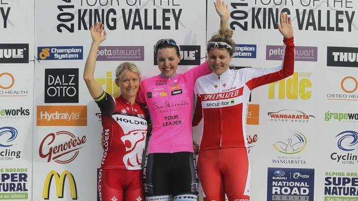 On the podium: Canberra cyclist and general classification winner Rebecca Wiasak is flanked by runner-up Ashlee Ankudinoff (right) and third place getter Ruth Corset (left). Photo: Con Chronis