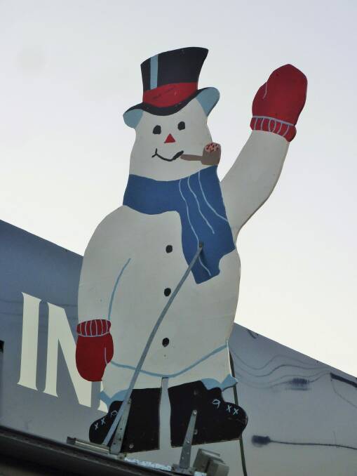 Friendly face: One of the dozens of snowmen that adorn the main street of Cooma. Photo: Tim The Yowie Man