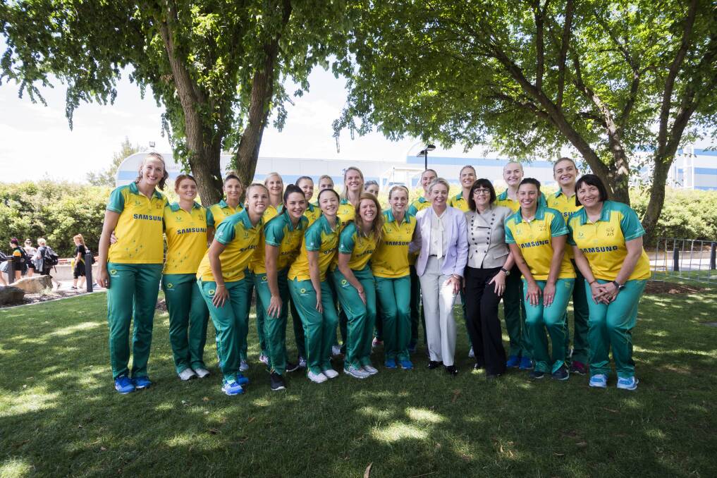 Sports minister Bridget McKenzie and Sport Australia boss Kate Palmer with the Australian netball team. Photo: Dion Georgopoulos