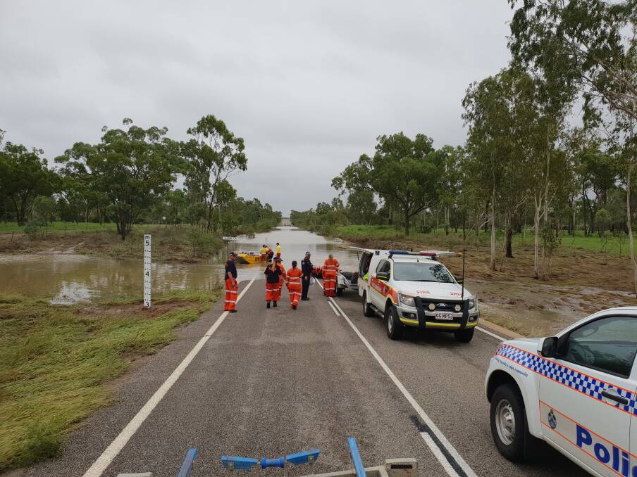 Police from Charters Towers and SES crews in the Townsville District have been out and about over the past few weeks, assisting with the evacuation of stranded motorists and the re-supply of grazing property owners in the area. Photo: Queensland Polcie Service