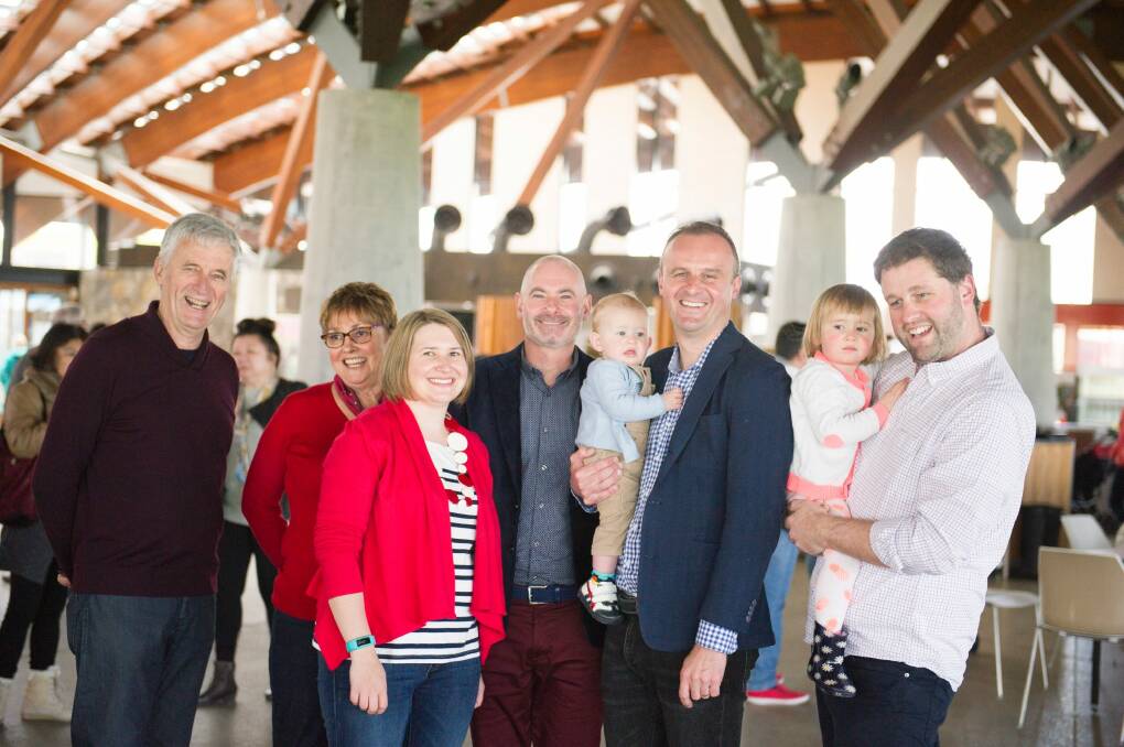 ACT Chief Minister Andrew Barr spends some time with his family at the aboretum: From left parents James and Susan Barr, sister-in-law Natalie Barr, partner Anthony Toms, Andrew Barr with nephew Angus, and brother Iain Barr with Zoe. Photo: Jay Cronan