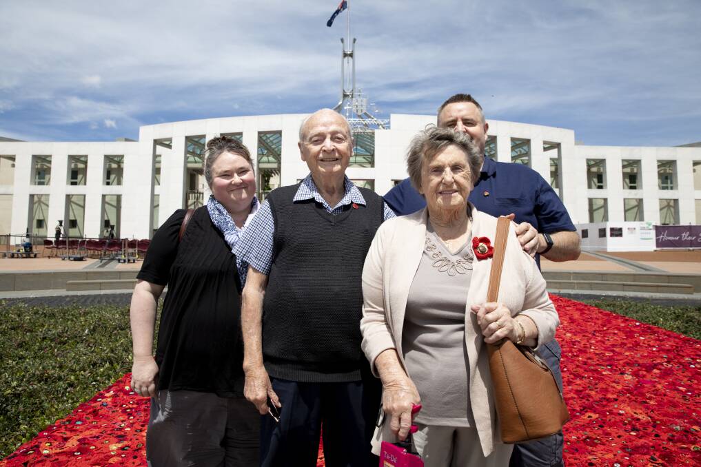 World War II veteran Don Haggarty, 92, and his wife Josie with their son Chris and daughter-in-law Alyson Brown at the opening of the carpet of poppies. Photo: Sitthixay Ditthavong