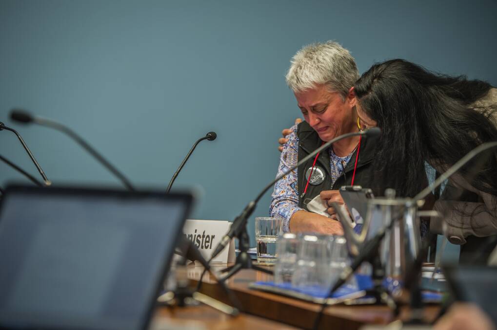 Louise Bannister breaks down in tears as she fronts an ACT inquiry into the NDIS.  Photo: Karleen Minney. 