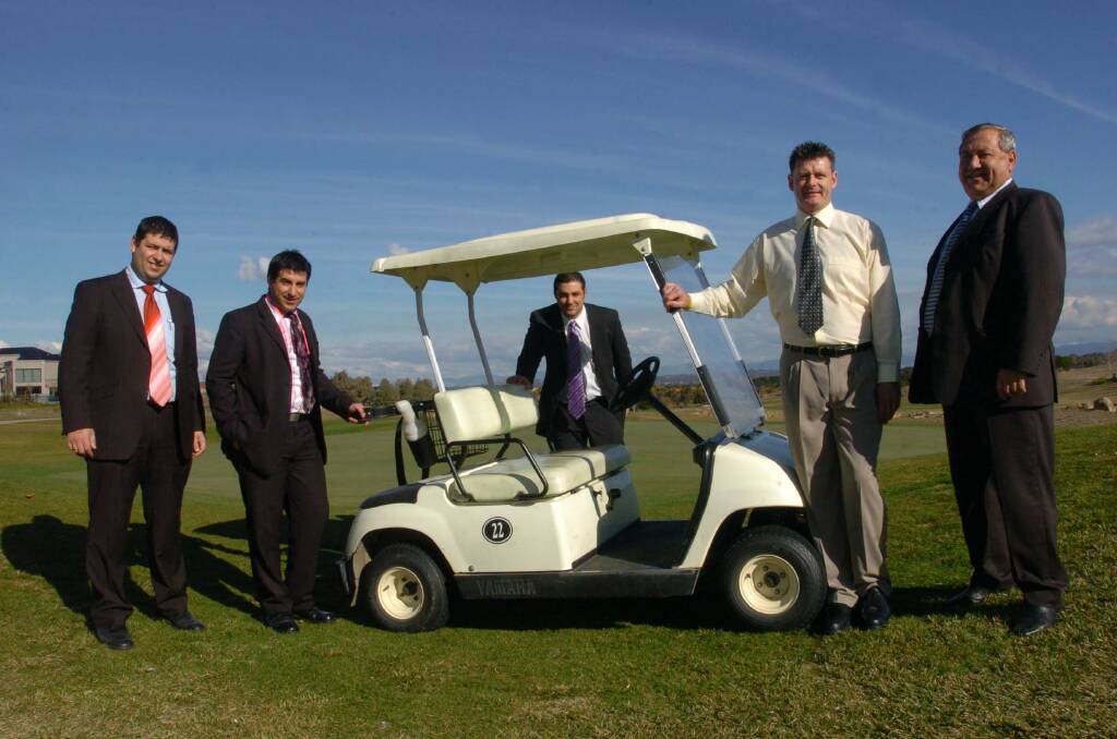 A 2006 picture of project directors Harry Konstantinou, John Konstantinou, Angelo Konstantinou, Gold Creek country club general manager Keith Lewis, and project managing director Geoff Konstantinou. Photo: Melissa Stiles