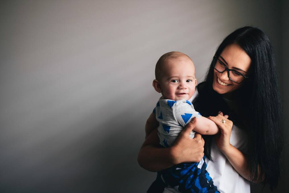 Ana Ewens at home with her 7-month-old son Luca. Photo: Rohan Thomson