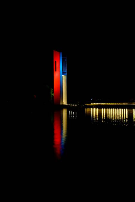 The Carillion at Lake Burley Griffin lit up in the colours of the French flag after the terrorist attacks in Paris on November 13. Photo: Dimitri Tolleter