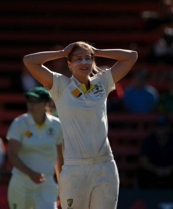 Chance missed: The Australian bowlers were unable to wrap up victory after Ellyse Perry's landmark double Century on Saturday. Photo: AAP
