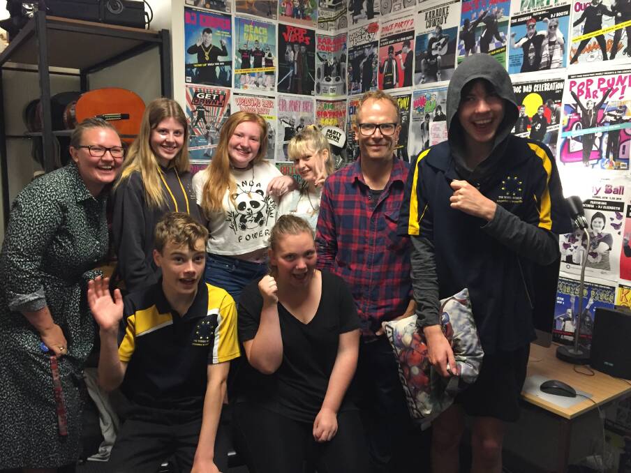 The Woden School teacher Sasha Posthuma-Grbic and youth support worker Luke Ferguson with students who appeared in the video - Genevieve Searson, Octavia Went, Hannah Williams, Joel Dickason and (front) Jacob Brennan and Hayley Simpson. Photo: Megan Doherty