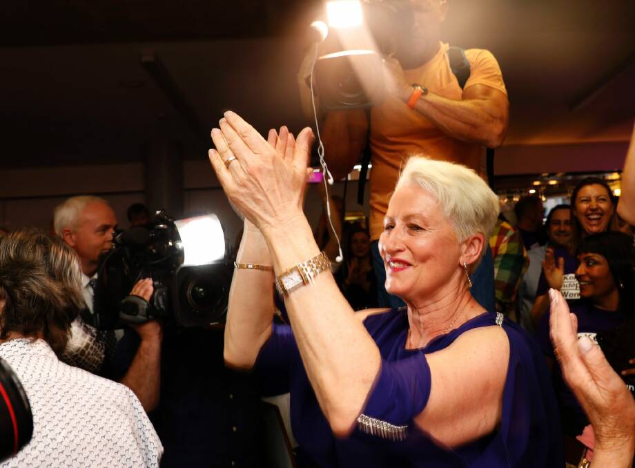 Independent candidate for Wentworth Kerryn Phelps is congratulated by supporters as she arrives for a Wentworth by-election evening function at North Bondi Life Saving Club, Sydney. Photo: Chris Pavlich