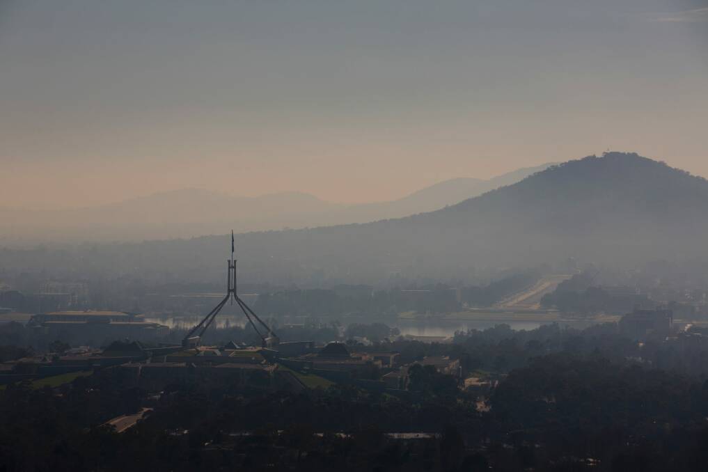 Smoke over Canberra on Wednesday morning due to the burn off at Kowen Forest. Photo: Jamila Toderas