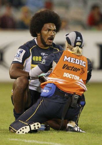 Henry Speight gets treatment after breaking his jaw against NSW. Photo: Getty Images