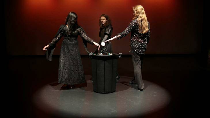 High School students from left, Martha De Ramos, Shoshana Lewis and Emily Bell playing the witches as they run through a scene in a production of <i>Macbeth</i> as part of the Bell Shakespeare Schools Festival during a rehearsal Calwell School Theatre. Photo: Jeffrey Chan