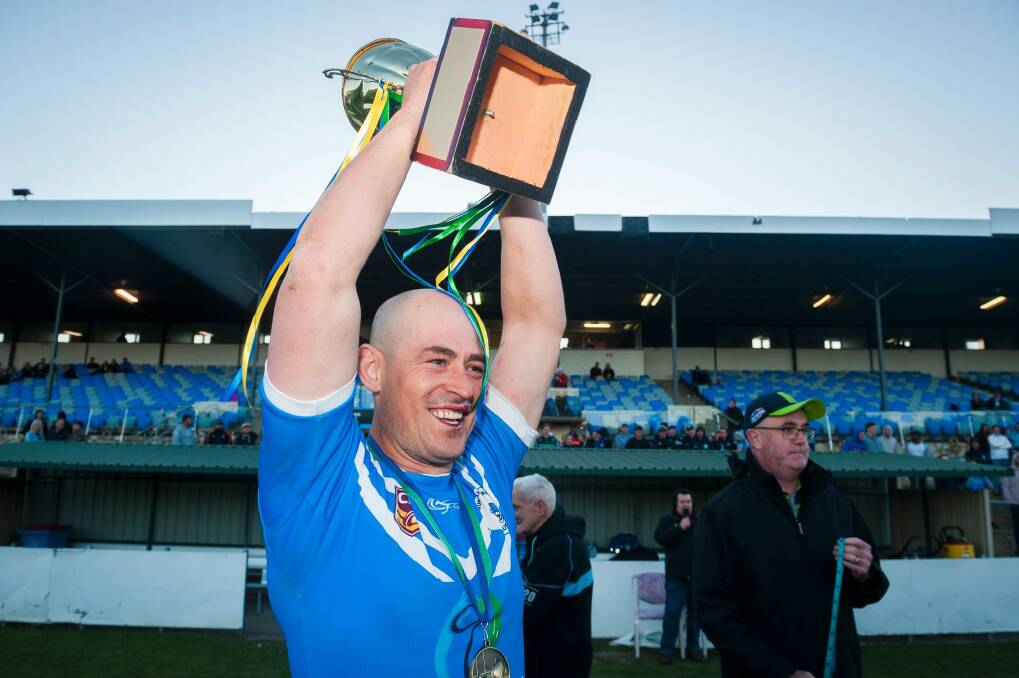 Queanbeyan Kangaroos Vs Queanbeyan Blues Grand Final. Terry Campese holds the trophy with pride after the Blues win the grand final. Photo: Dion Georgopoulos Photo: Dion Georgopoulos