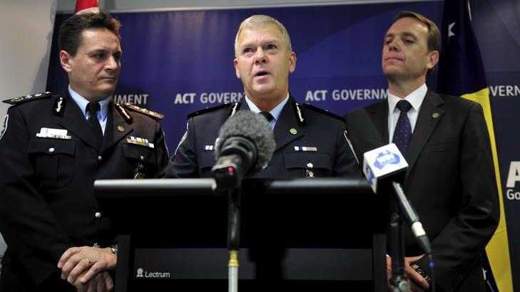 Top cop ... New ACT Chief Police Officer Rudi Lammers, centre, with AFP Commissioner Tony Negus and Police Minister Simon Corbell. Photo: Jay Cronan