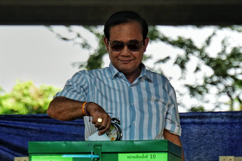 On course for victory: Prayut Chan-o-cha casts is vote on Sunday. Photo: Amilia Rosa