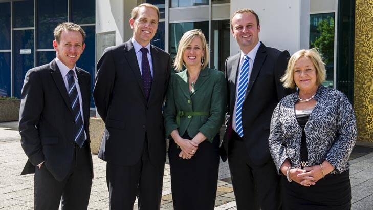 ACT's new cabinet, Greens' Shane Rattenby, with Labor's Simon Corbell, Katy Gallagher, Andrew Barr, and Joy Burch, outside the ACT Legislative Assembly this morning. Photo: Rohan Thomson