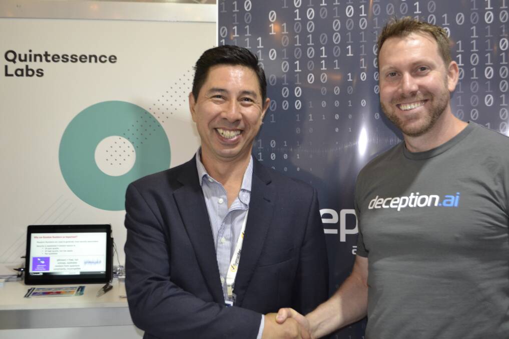 Vince Lee from QuintessenceLabs with deception.ai chief executive Ben Whitham at the Australian Cyber Security Centre conference in Canberra, where they announced a new partnership on Wednesday. Photo: Supplied